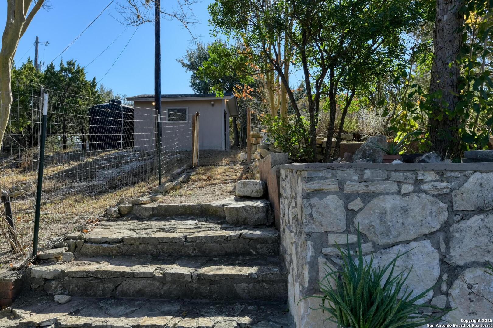 105 Shane Lane Boerne, TX 78006 - Photo 50 of 64 a view of a backyard with plants