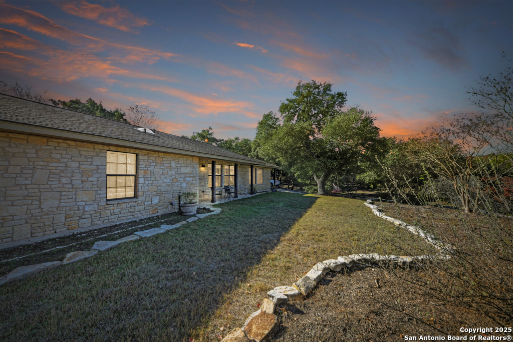 105 Shane Lane Boerne, TX 78006 - Photo 5 of 64 a view of a backyard of the house