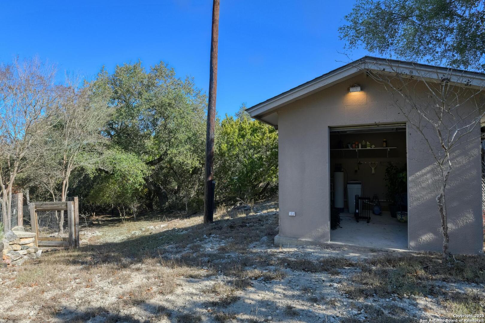 105 Shane Lane Boerne, TX 78006 - Photo 51 of 64 a front view of a house with a yard