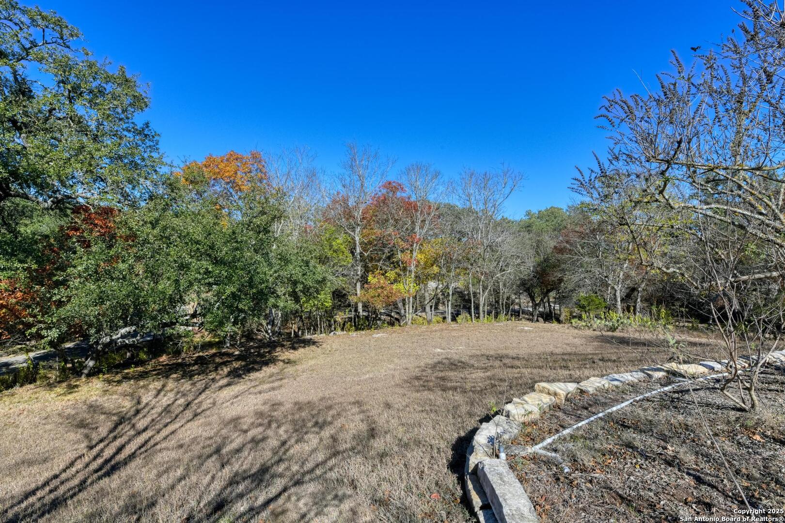 105 Shane Lane Boerne, TX 78006 - Photo 55 of 64 a view of a backyard of a house