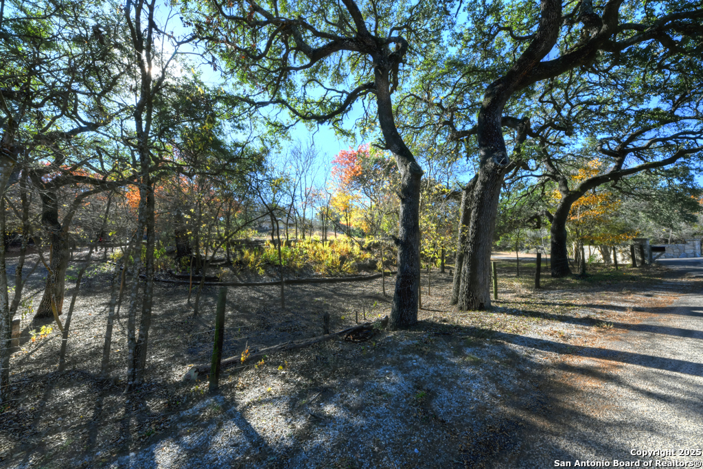 105 Shane Lane Boerne, TX 78006 - Photo 58 of 64 a backyard of a house with lots of green space