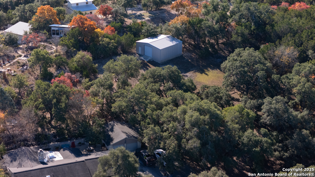 105 Shane Lane Boerne, TX 78006 - Photo 64 of 64 an aerial view of a house with a yard and lake view
