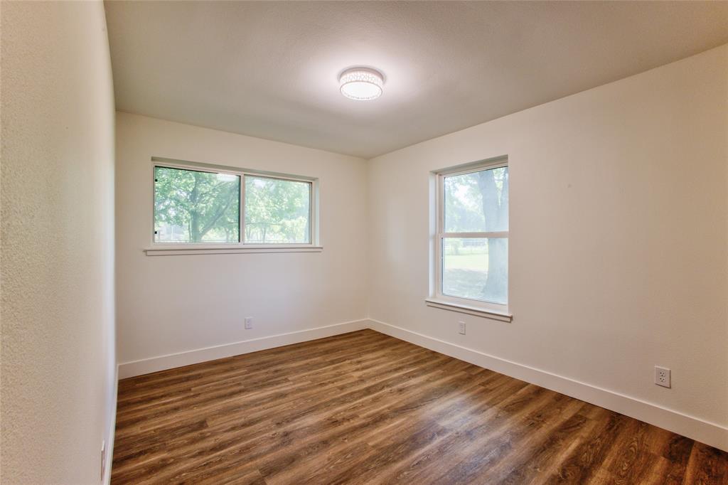 206 Americana Road Palmer, TX 75152 - Photo 22 of 40 View #1 Into #3 Bedroom