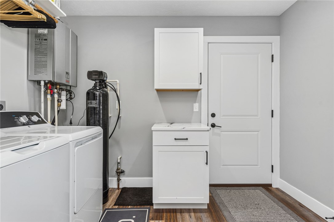 1602 Westboro Road Blanchester, OH 45107 - Photo 20 of 81 This functional laundry room features modern amenities for ultimate convenience and efficiency.