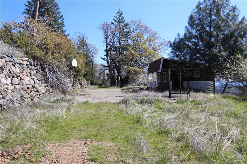 10155 Socrates Mine Road Middletown, CA 95461 - Photo 11 of 69 a backyard of a house with lots of green space