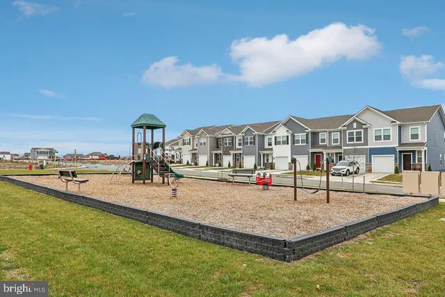 a view of swimming pool with outdoor seating