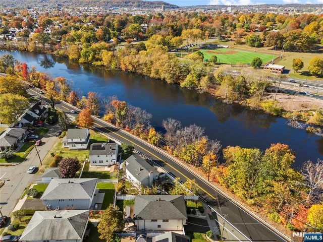 an aerial view of a city with ocean view