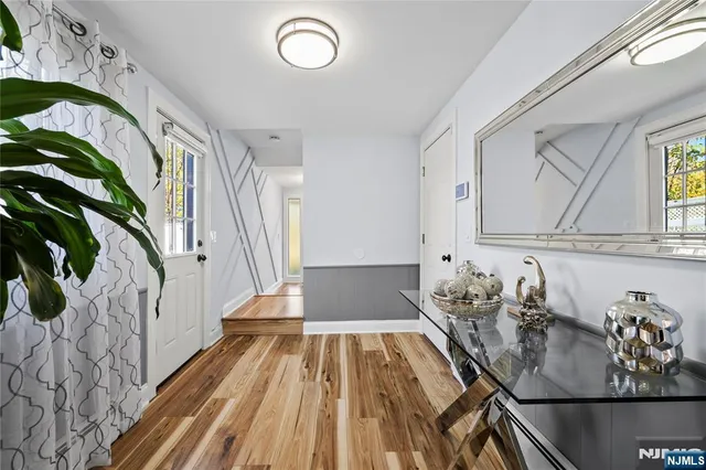 a view of a living room and a entryway