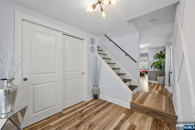 a view of entryway with wooden floor