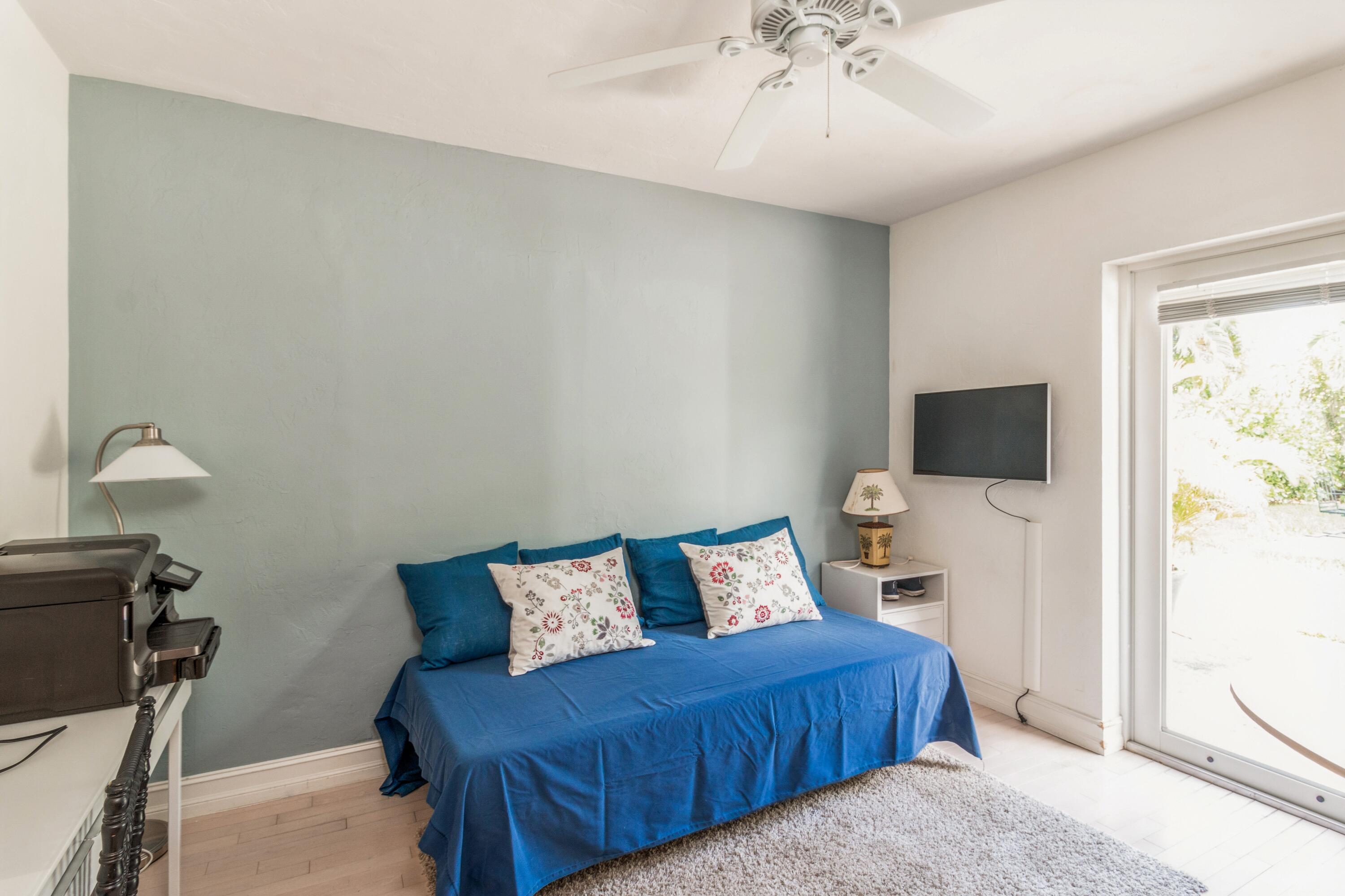 308 Pilgrim Road West Palm Beach, FL 33405 - Photo 11 of 18 2nd bedroom/out to pool