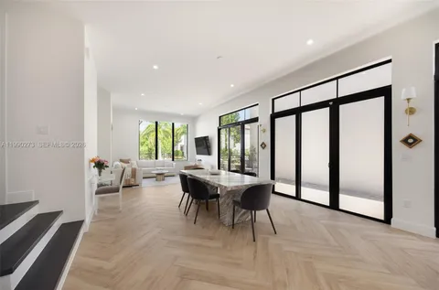 a view of a livingroom with furniture and window