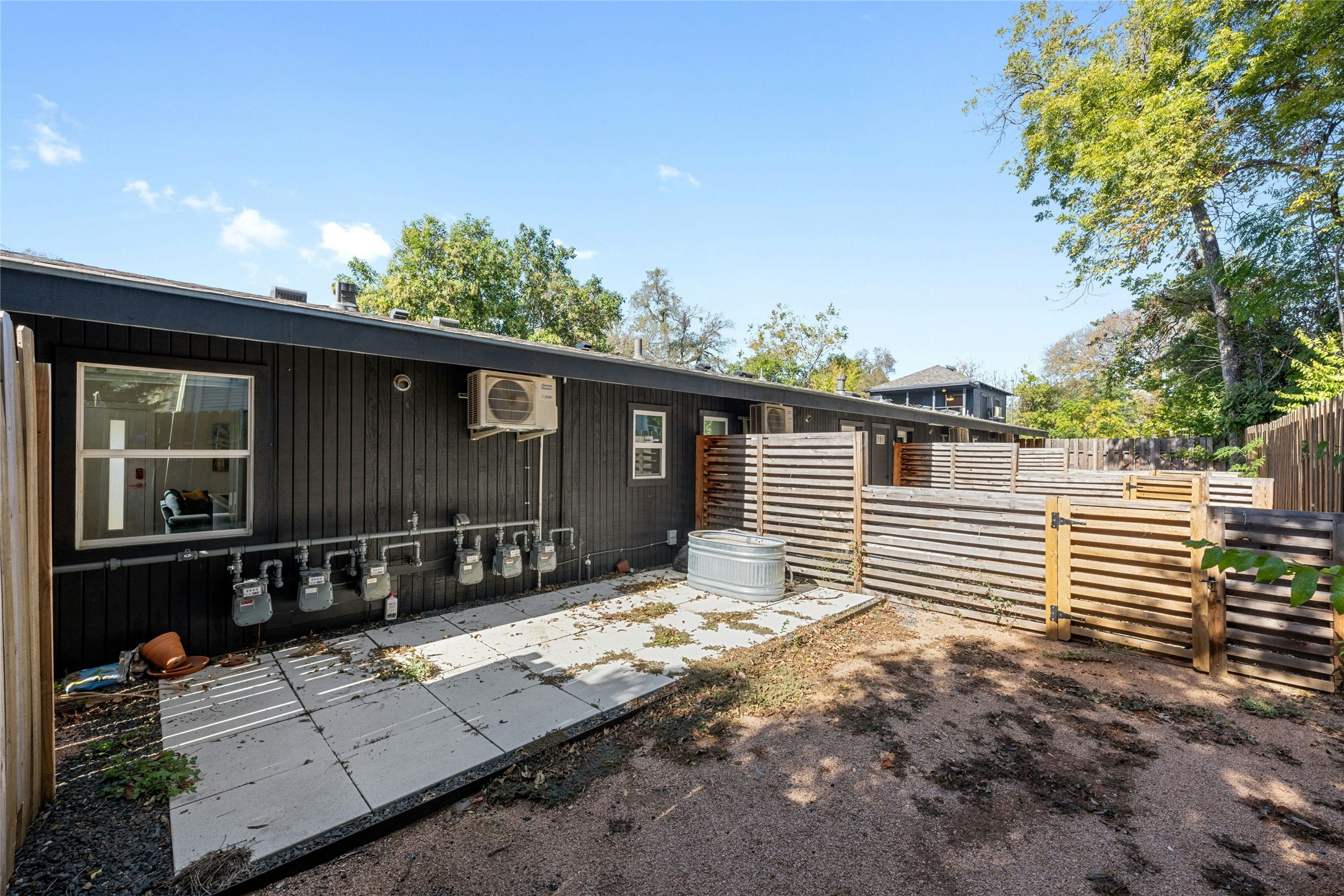 2201 Leon Street, Unit D Austin, TX 78705 - Photo 22 of 24 a view of house with backyard and sitting area