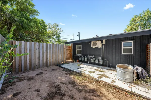 a view of a patio outdoor space and backyard