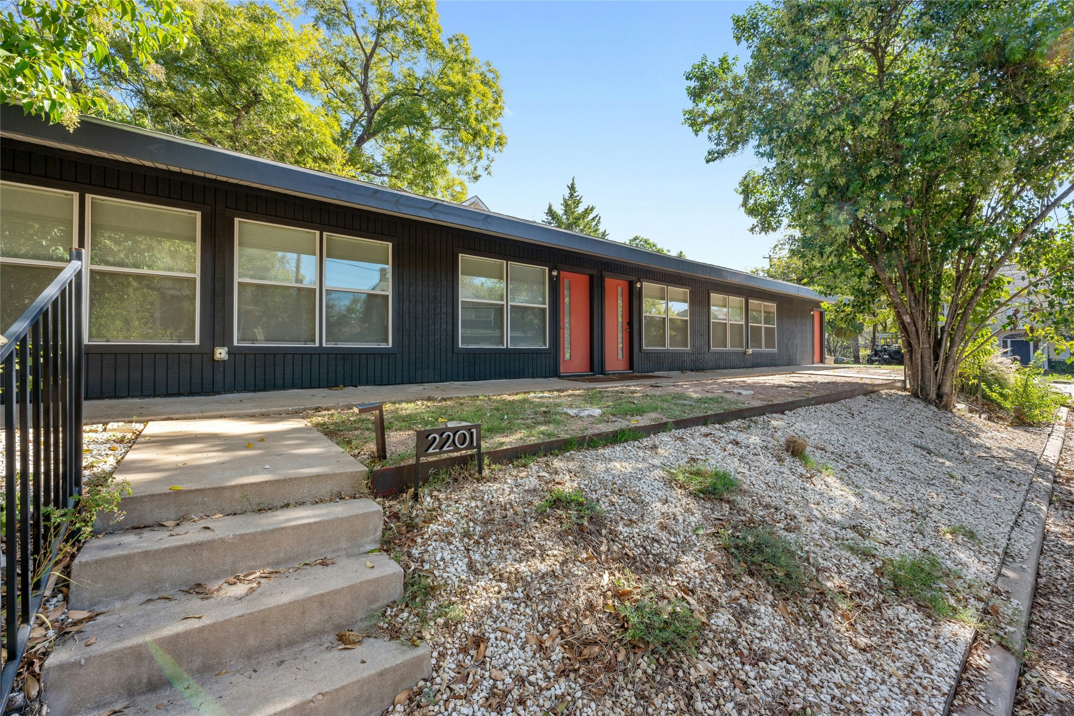 2201 Leon Street, Unit D Austin, TX 78705 - Photo 4 of 24 a front view of a house with garden