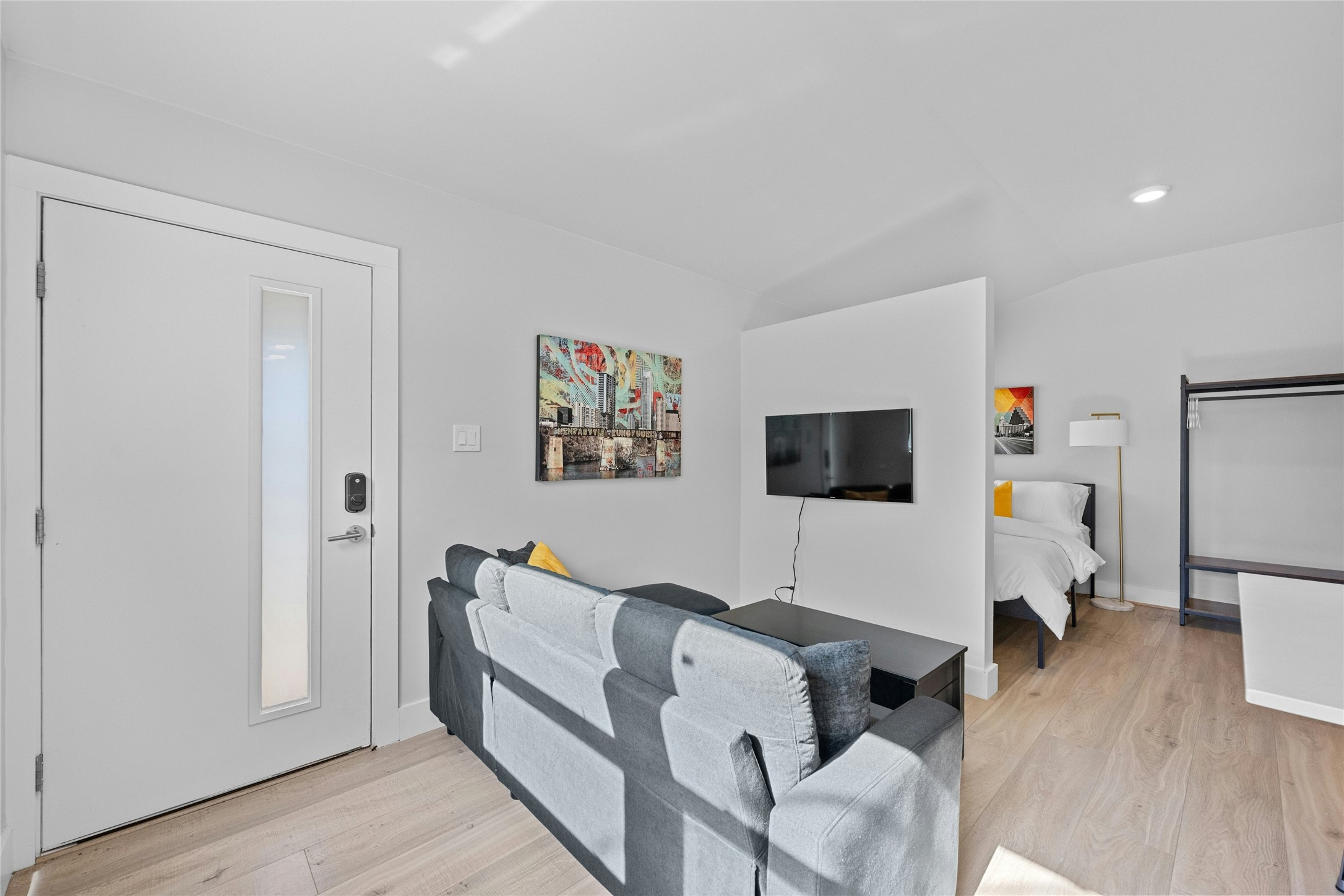 2201 Leon Street, Unit D Austin, TX 78705 - Photo 6 of 24 a living room with furniture and a flat screen tv