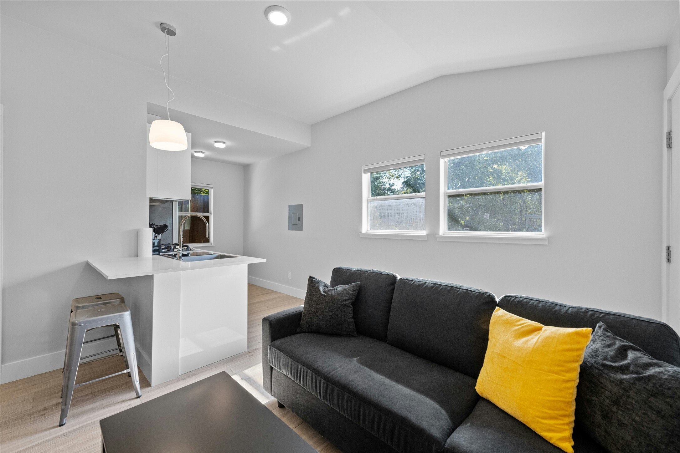 2201 Leon Street, Unit D Austin, TX 78705 - Photo 8 of 24 a living room with furniture and a window