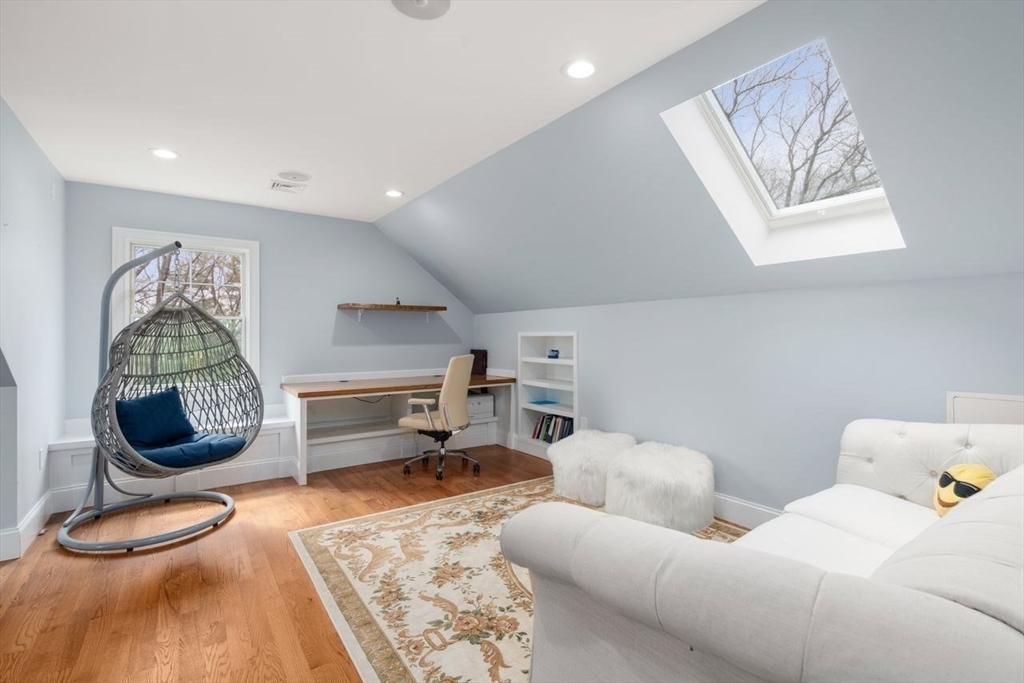 56 Blossomcrest Road Lexington, MA 02421 - Photo 22 of 29 a bedroom with furniture and a wooden floor