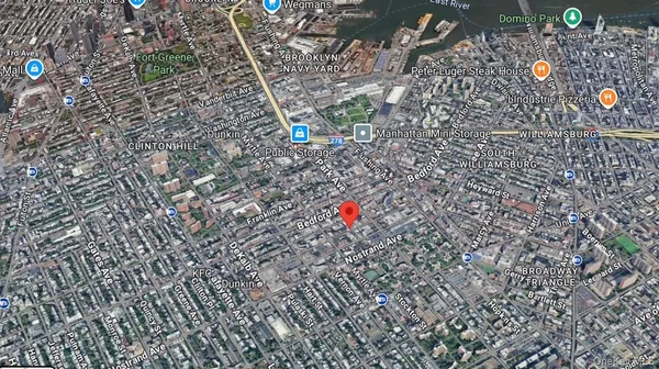 a front view of a house with parking space