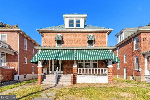 a view of a house with a patio