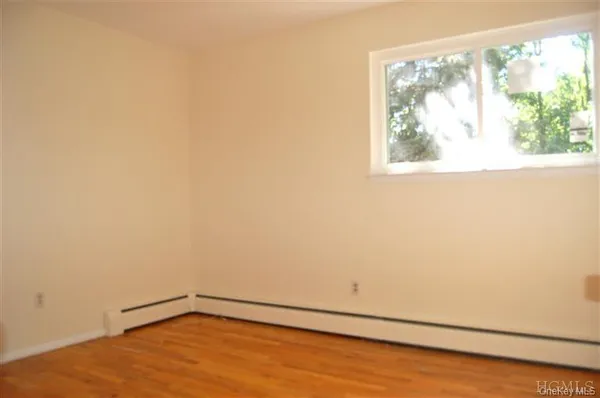 a view of backyard with green space