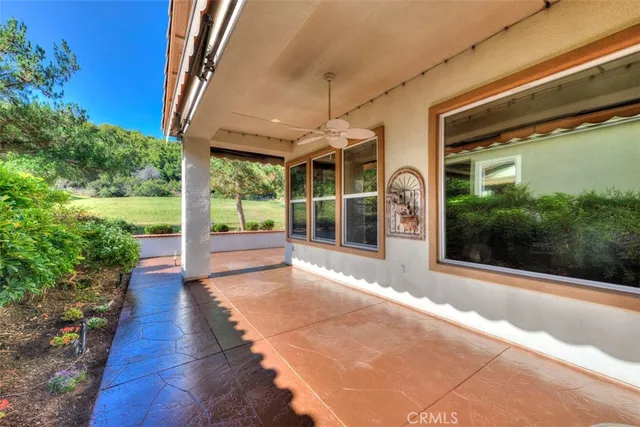 a view of porch with a furniture