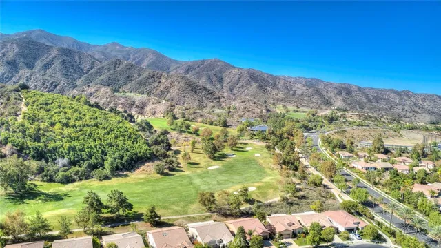 a view of mountain and a mountain in the background