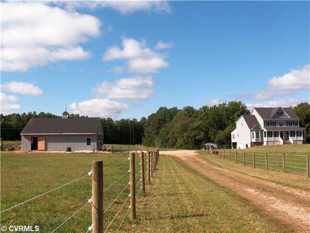 Exterior Front - View front street - New barn, new fences, new run-in and like new home !!!!  A truly horse ready equestrian property