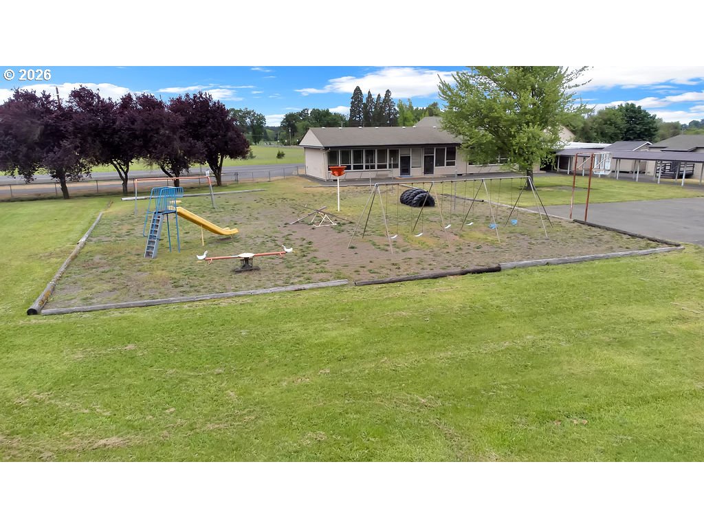 21211 Coburg Road Harrisburg, OR 97446 - Photo 46 of 48 a view of a house with a backyard