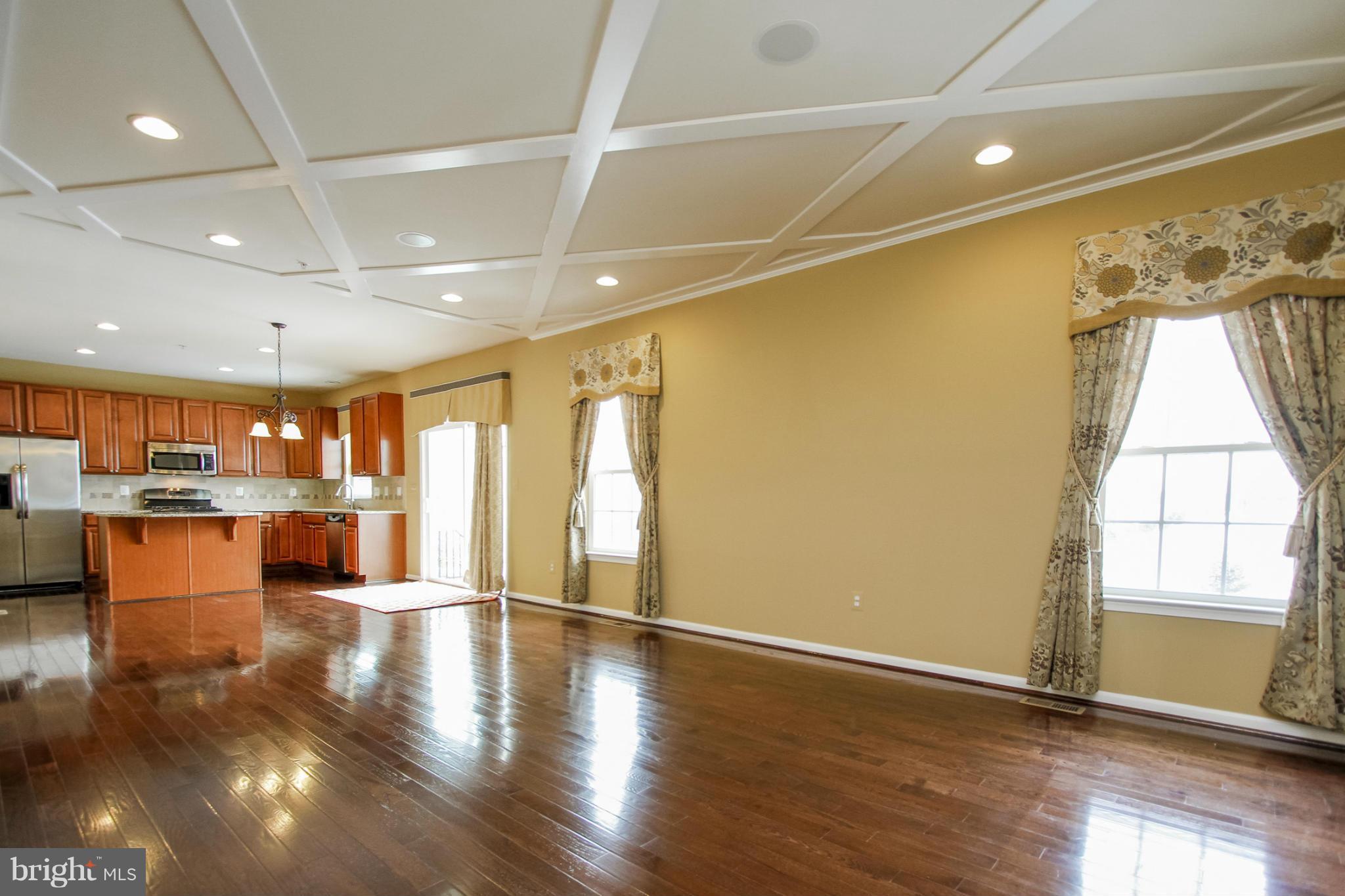 5735 Allender Road White Marsh, MD 21162 - Photo 12 of 30 Family Room w/ Sliding Doors to Stone Patio