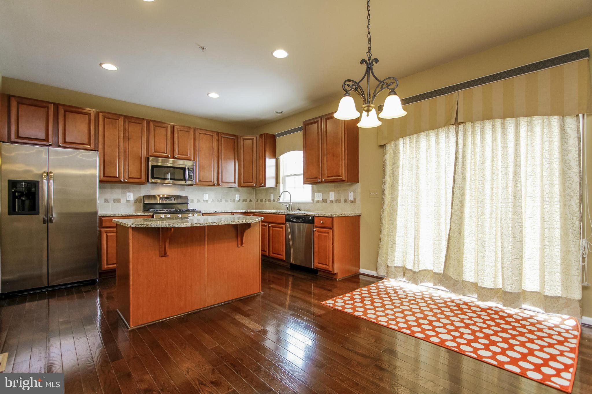 5735 Allender Road White Marsh, MD 21162 - Photo 13 of 30 Kitchen w/ Sliding Doors to Stone Patio