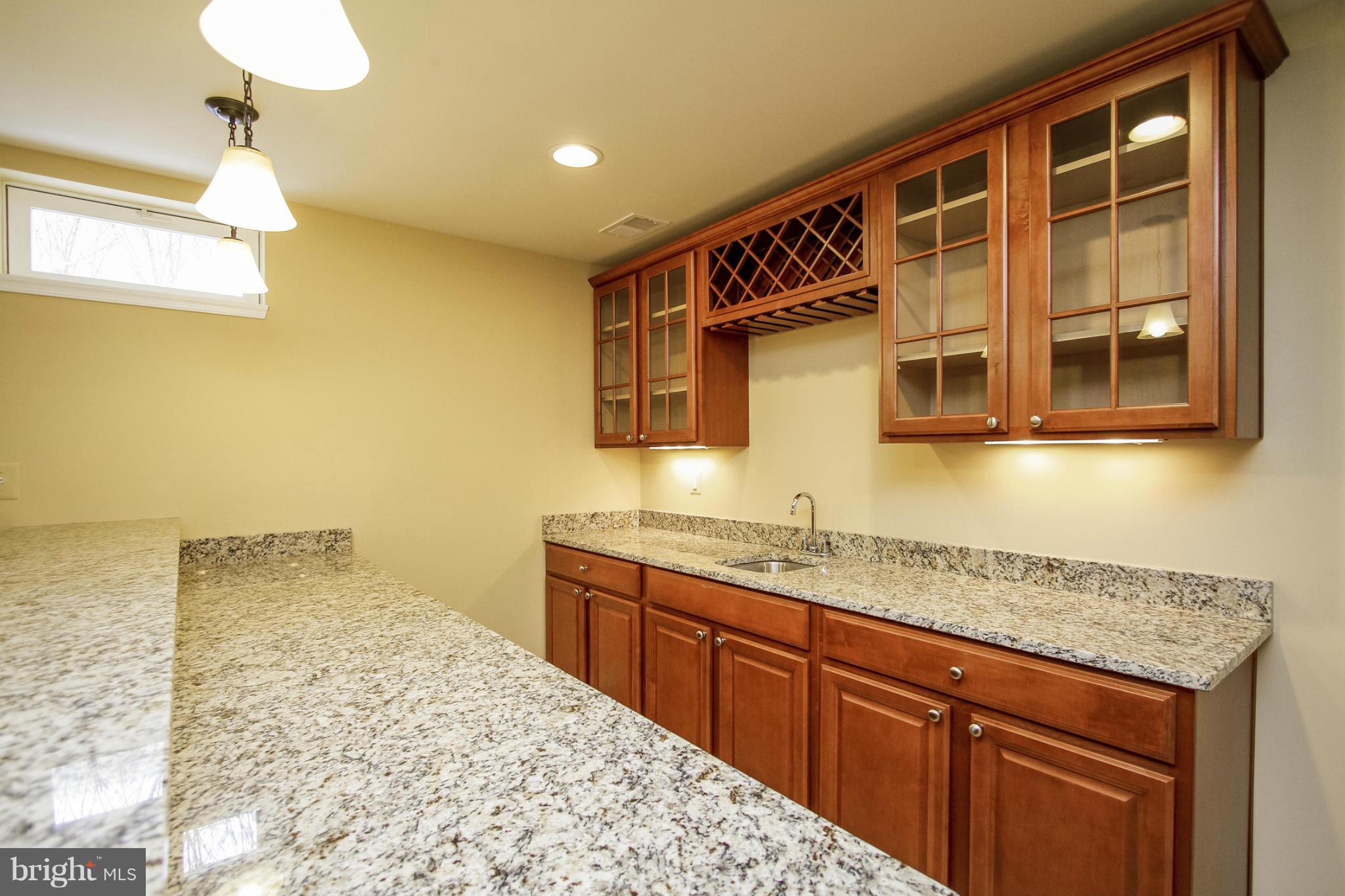 5735 Allender Road White Marsh, MD 21162 - Photo 18 of 30 Basement Wet Bar w/ Granite Counters