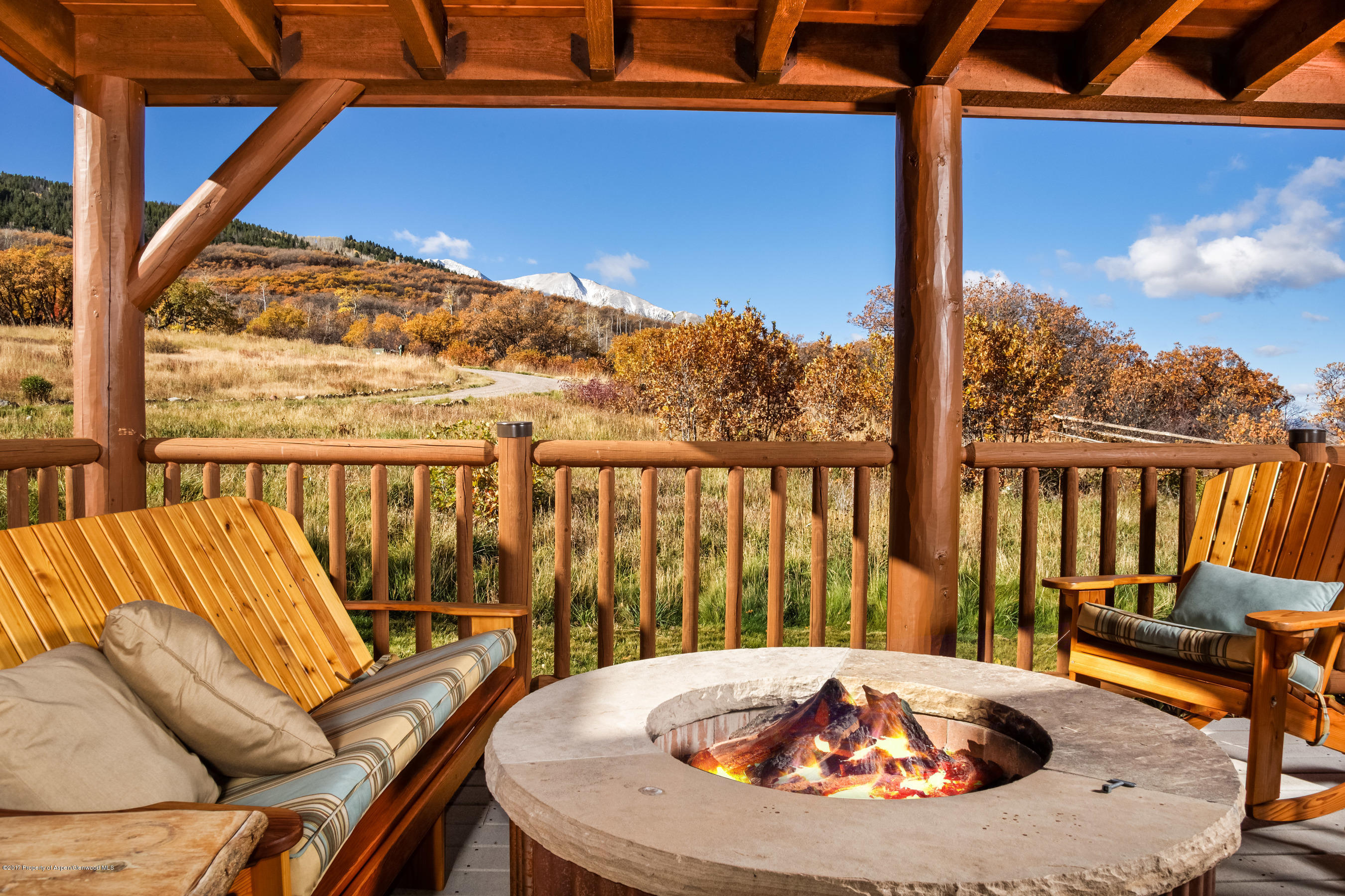 4000 Sopris Mountain Ranch Road Basalt, CO 81621 - Photo 30 of 39 Covered deck with fire pit