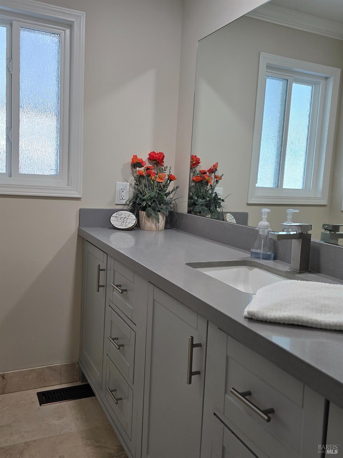108 Cardinal Way Santa Rosa, CA 95409 - Photo 3 of 20 a bathroom with a granite countertop sink mirror and cabinets