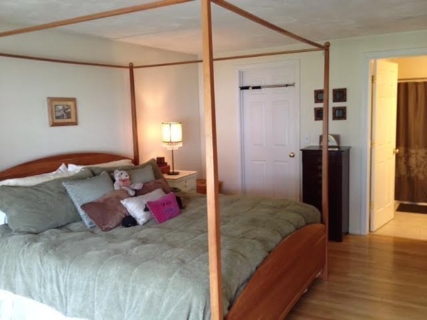 8 Charles Ridge Road, Unit C802 Littleton, MA 01460 - Photo 15 of 30 a bedroom with a bed and a walk in closet