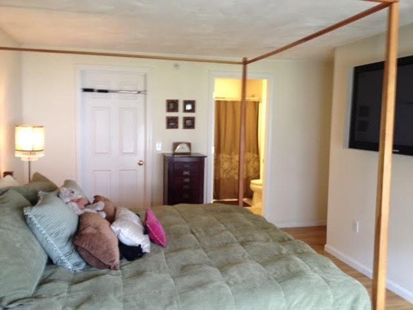 8 Charles Ridge Road, Unit C802 Littleton, MA 01460 - Photo 16 of 30 a bed room with a bed and a window