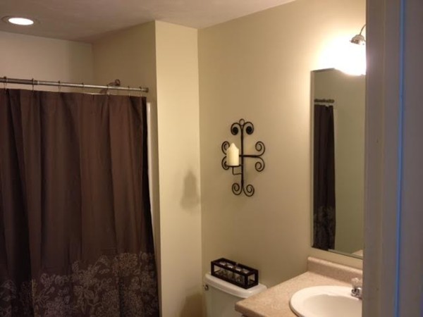 8 Charles Ridge Road, Unit C802 Littleton, MA 01460 - Photo 17 of 30 a bathroom with a shower a toilet and sink
