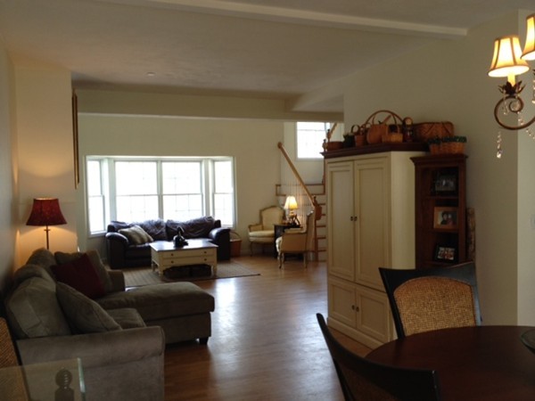 8 Charles Ridge Road, Unit C802 Littleton, MA 01460 - Photo 7 of 30 a living room with furniture and a window