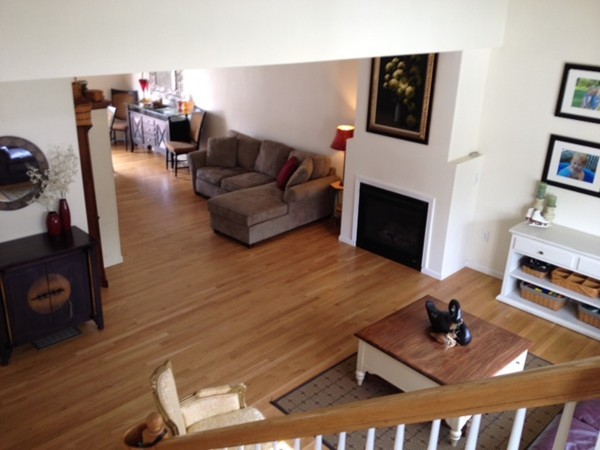 8 Charles Ridge Road, Unit C802 Littleton, MA 01460 - Photo 8 of 30 a living room with furniture and a fireplace