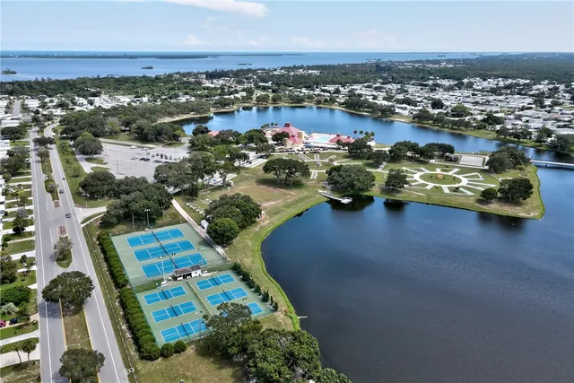 an aerial view of a houses with outdoor space