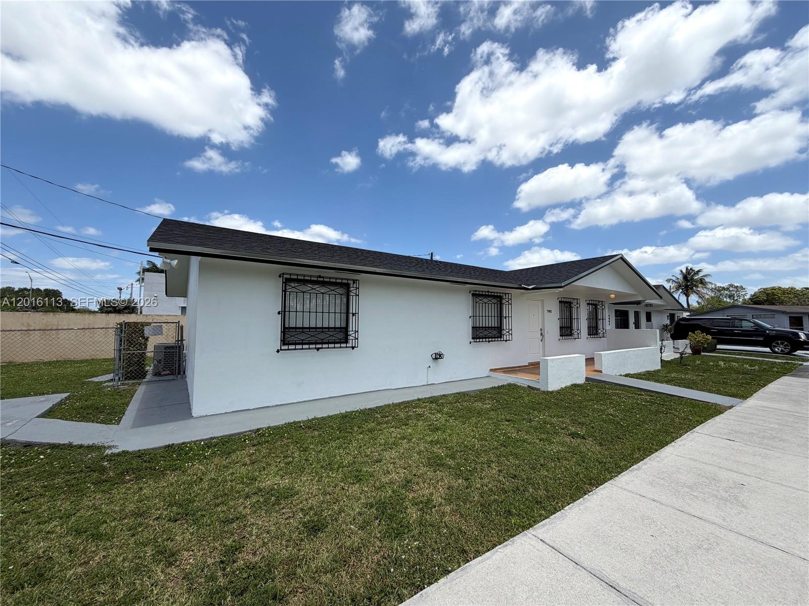 7993 Southwest 9th Terrace Miami, FL 33144 - Photo 13 of 18 a house view with a garden space