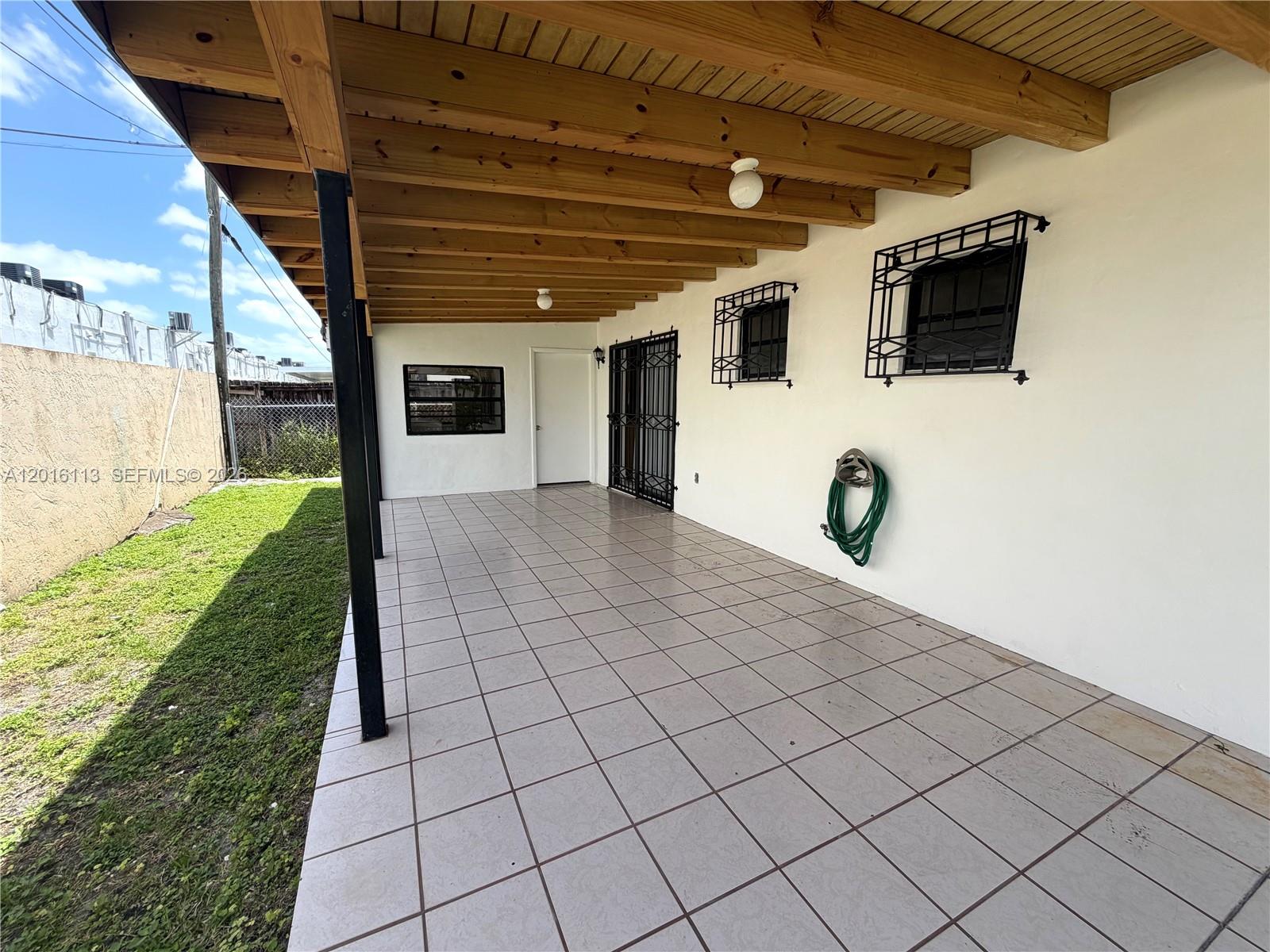 7993 Southwest 9th Terrace Miami, FL 33144 - Photo 3 of 18 a view of a porch
