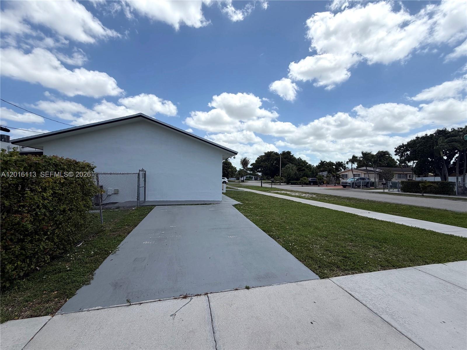 7993 Southwest 9th Terrace Miami, FL 33144 - Photo 9 of 18 a house view with a garden space