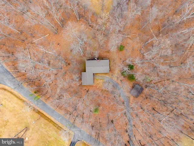 a picture of a wall with a bench in the background