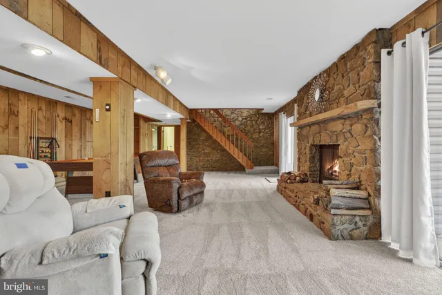 a room with lot of furniture and a window