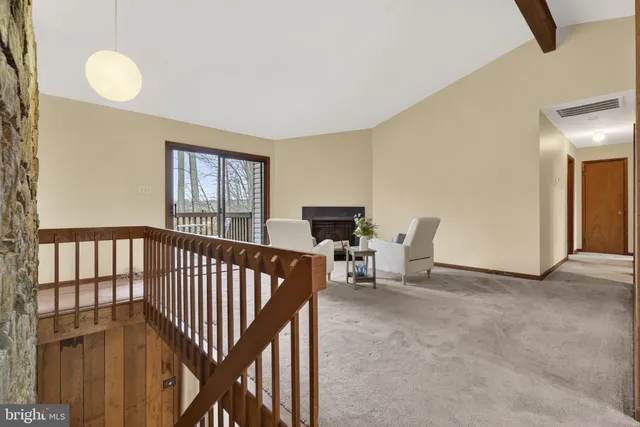 a view of livingroom with furniture and window
