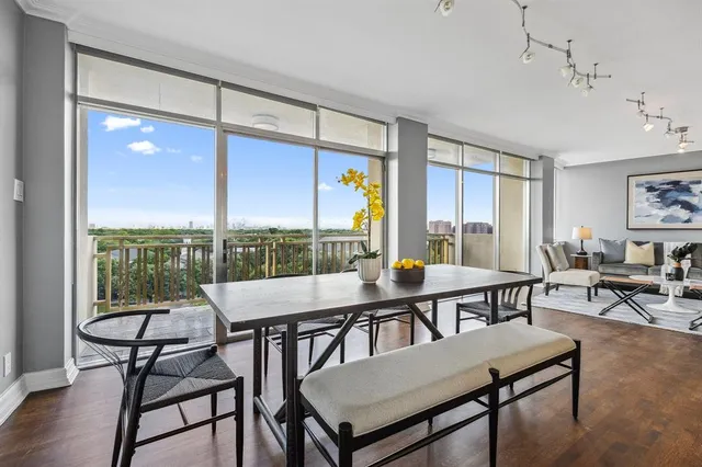 a view of a dining room with furniture window and outside view