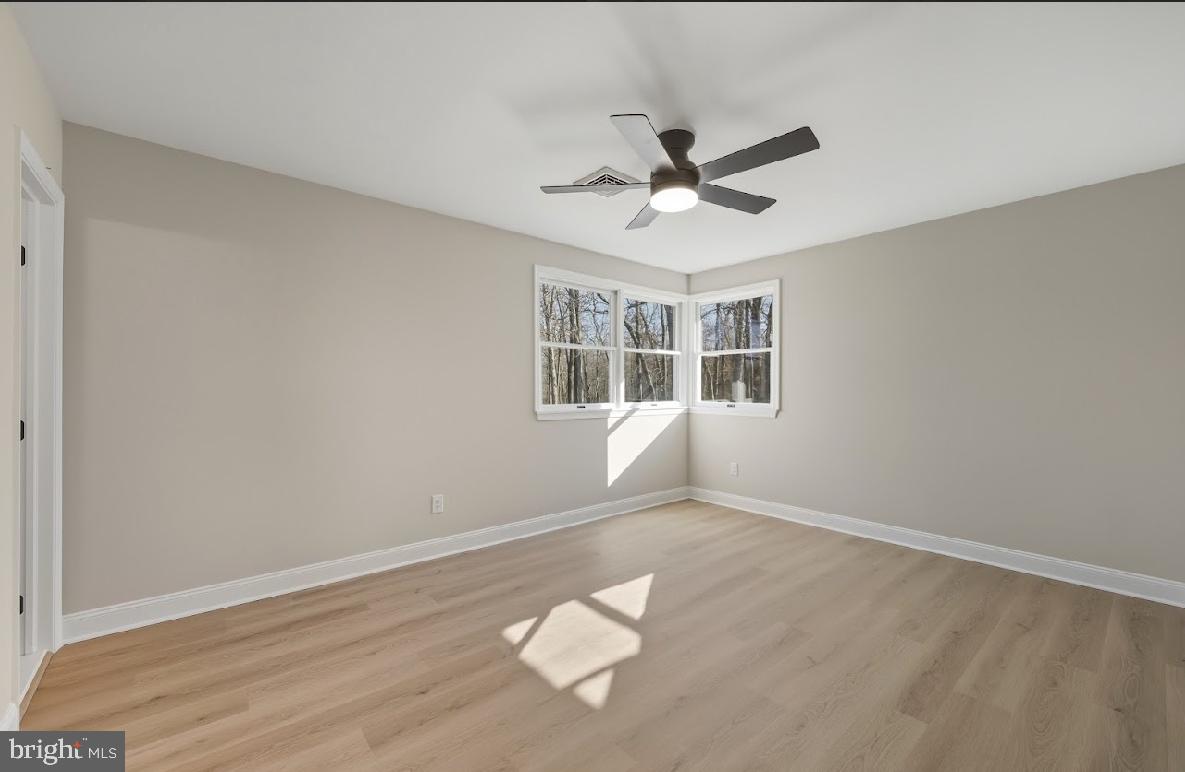 825 Mays Landing Road Hammonton, NJ 08037 - Photo 18 of 33 a view of an empty room with a window