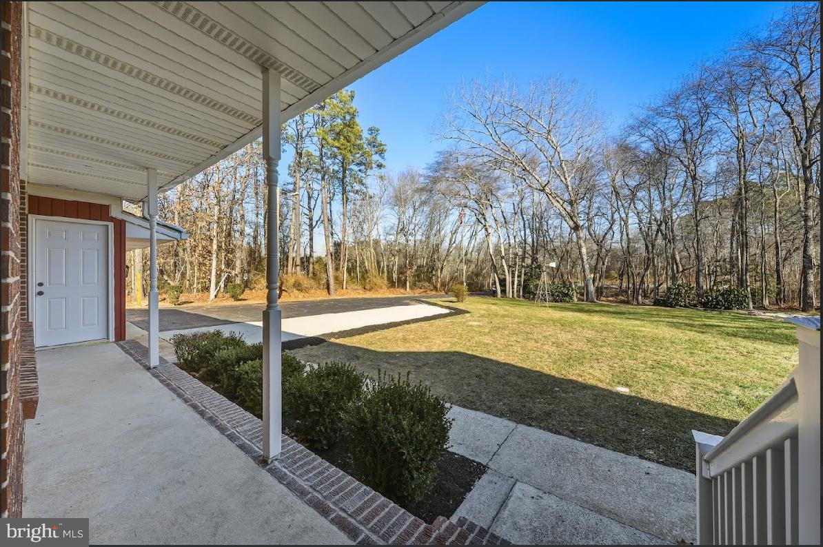 825 Mays Landing Road Hammonton, NJ 08037 - Photo 2 of 33 a view of a yard with an umbrella