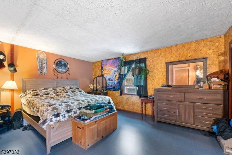 43 Meyers Road Montague, NJ 07827 - Photo 14 of 23 a bedroom with a bed and dresser with mirror