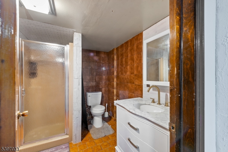 43 Meyers Road Montague, NJ 07827 - Photo 15 of 23 a bathroom with a granite countertop sink mirror vanity and toilet